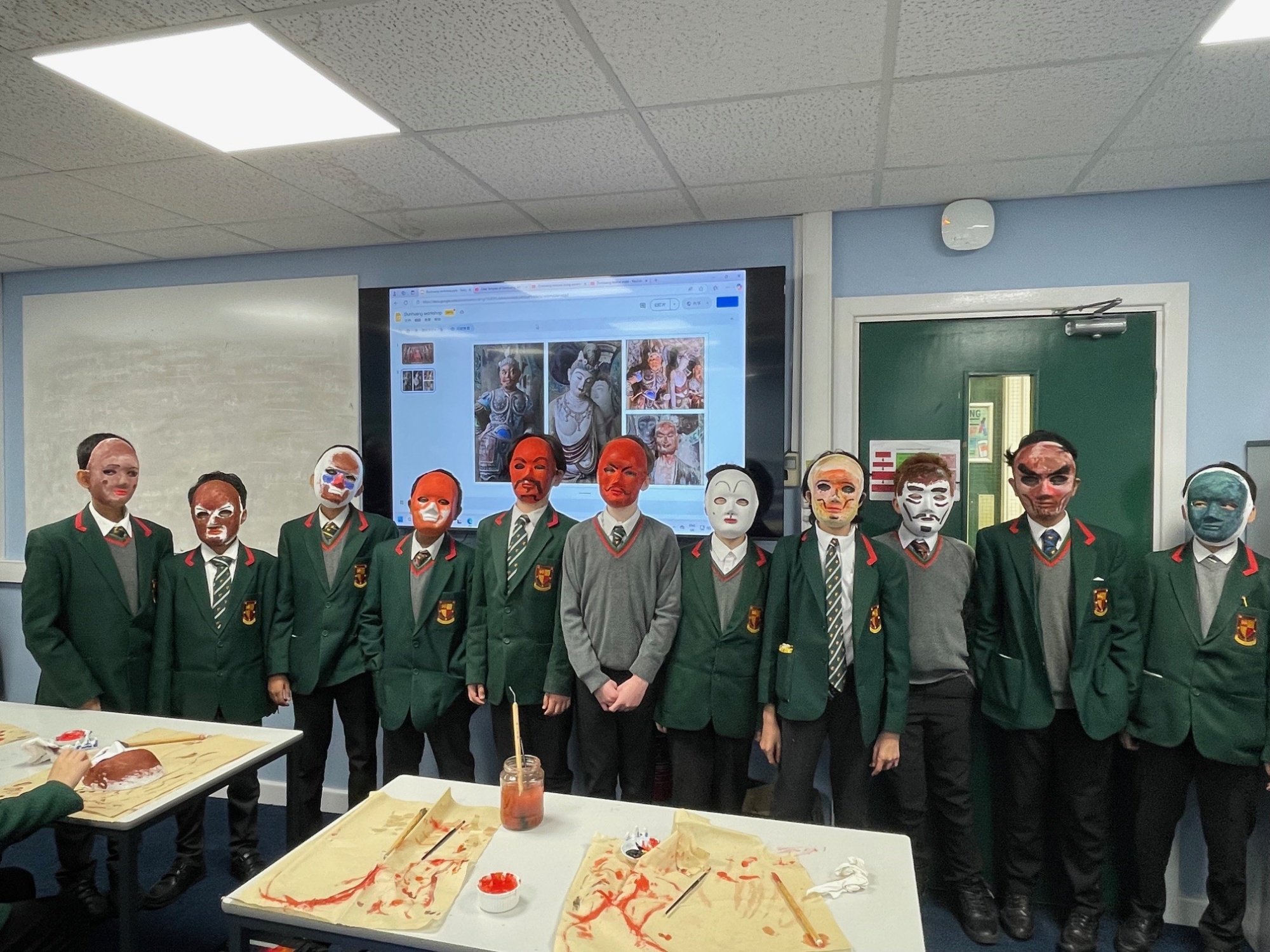 Pupils wearing the Masks they made